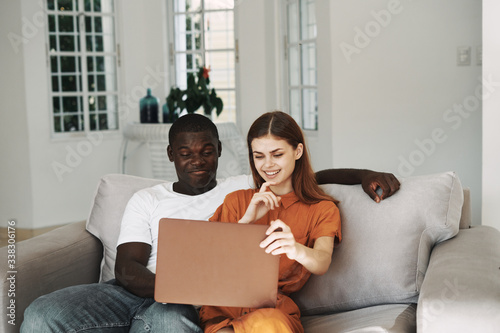 young couple with laptop © SHOTPRIME STUDIO