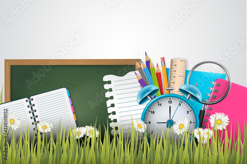 School banner with supplies in green grass with flowers. 3d realistic vector illustration.