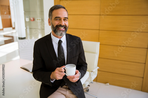 Handsome middle aged busine...