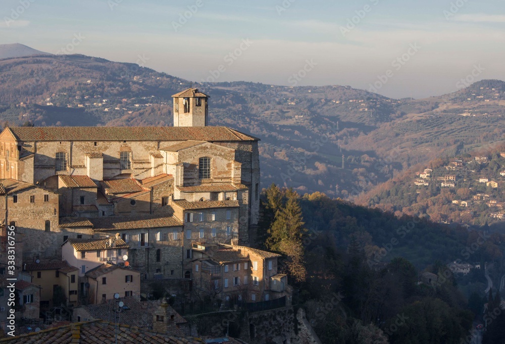 Historic building in Perugia surrounded by hills