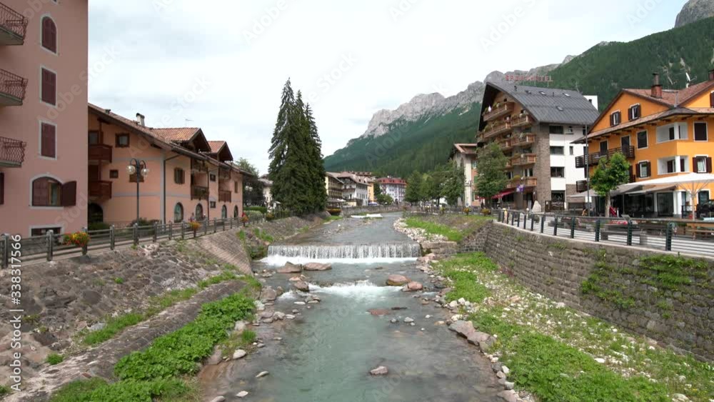 Beautiful Nature Scenery Of A Calm River Flowing On The Rocky Stream In The Town Of Muena In Italy - Wide Shot Beautiful Nature Scenery Of A Calm River Flowing On The Rocky Stream In The Town Of Muena In Italy - Wide Shot