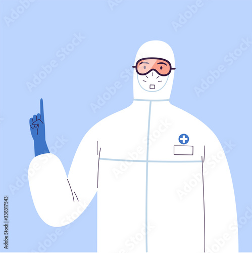 Doctor in a protective suit, glasses and a medical mask points a finger at something.
