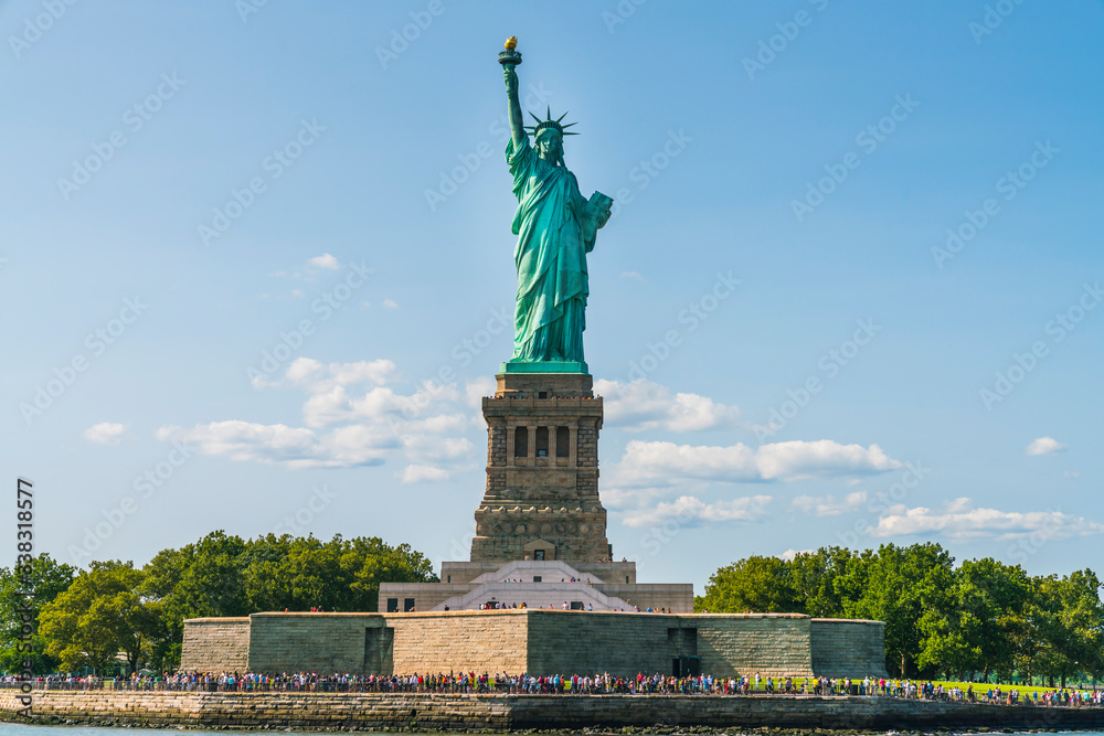 Fototapeta premium The statue of Liberty with blue sky background.