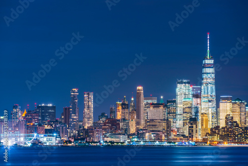 new york,usa, 08-25-17: new york city skyline at night with reflection in hudson river.