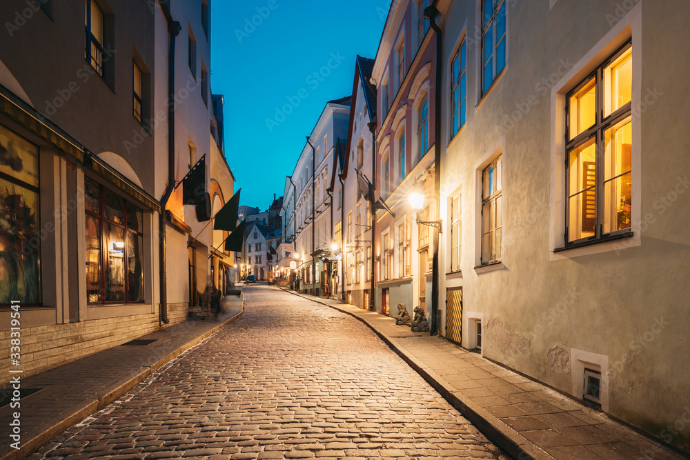 Tallinn, Estonia. View Of Old Architecture On Dunkri Street In Evening Night Illuminations