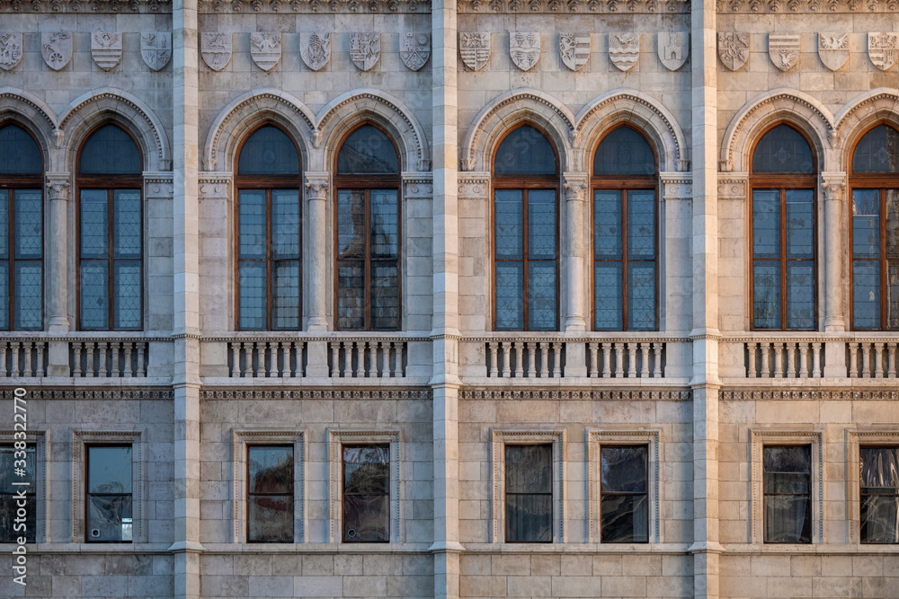 Front view Hungarian Parliament facade. Windows and decoration of walls