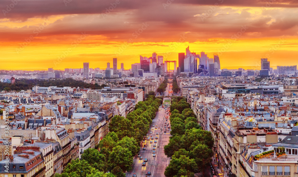 Paris, France. Fantastic view of business district of Paris during dramatic sunset. Panorama of city streets from above, fascinating summer season in the most romantic World Capital city Paris.