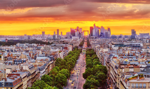 Paris, France. Fantastic view of business district of Paris during dramatic sunset. Panorama of city streets from above, fascinating summer season in the most romantic World Capital city Paris.
