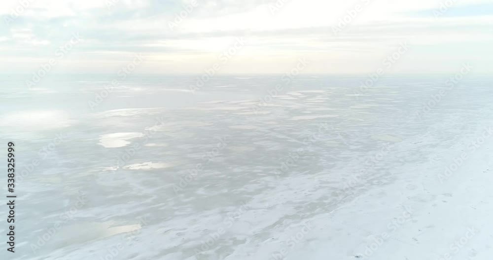 frozen sea and coastline in the snow, aerial photography frozen sea and coastline in the snow, aerial photography