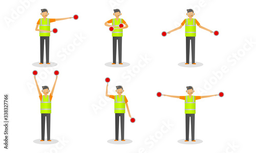 Set of young traffic controller in special costume with signs during work