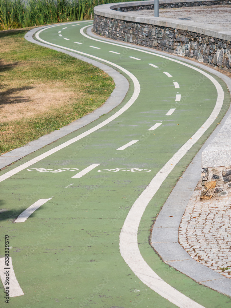 Green curved bikeway in Braganca, Portugal