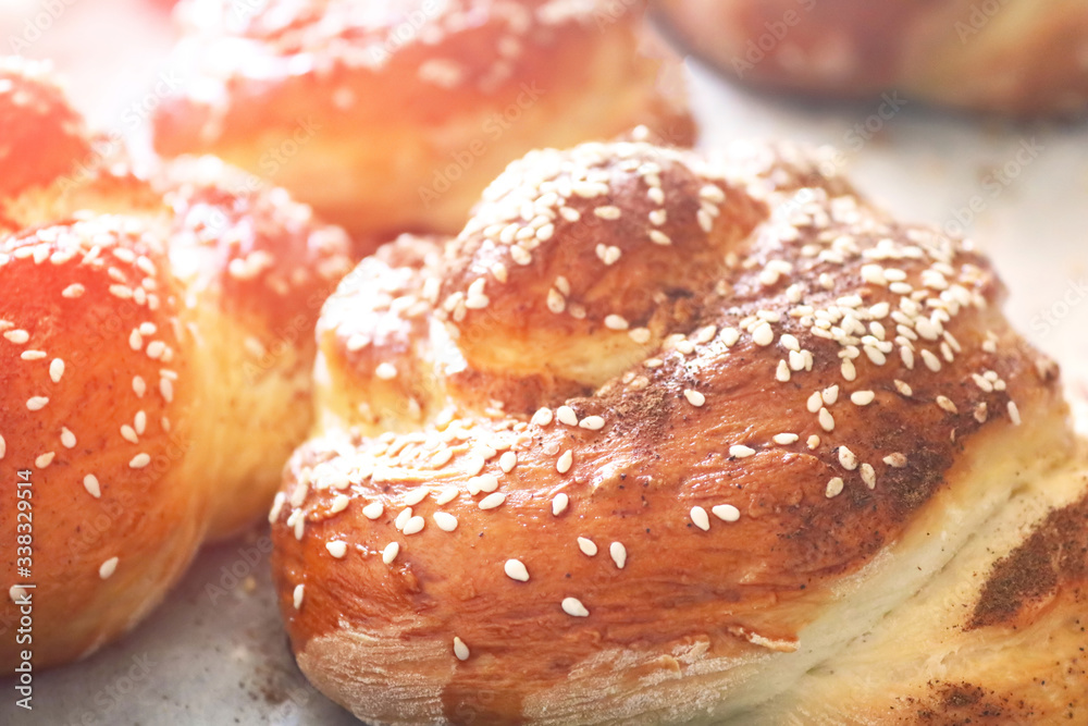 Fresh twisted buns with sesame seeds in the early morning. Morning sunshine