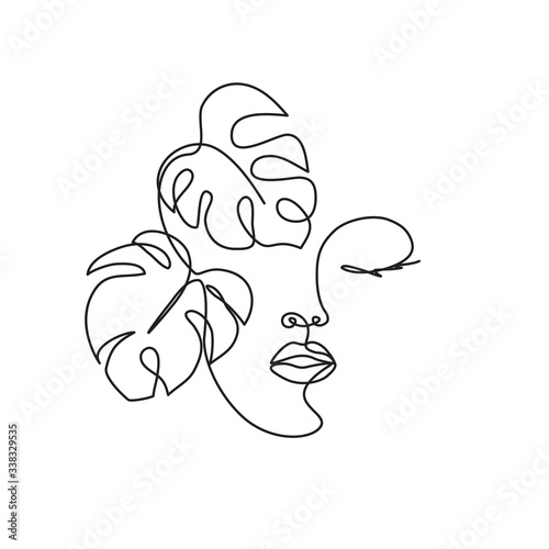 Line drawing of the profile of a woman with flowing hair and flowers, for organic cosmetics