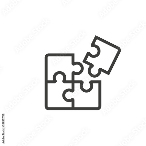 Puzzle pieces icon vector on white background photo