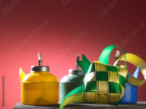 oil lamp and ribbon ketupat