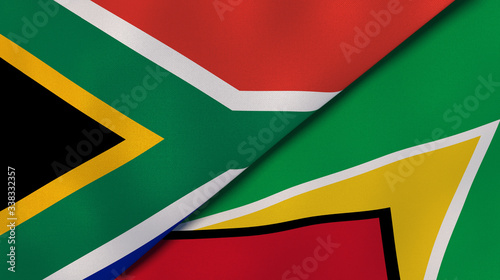 The flags of South Africa and Guyana. News, reportage, business background. 3d illustration