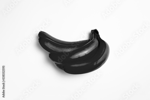 Black Banana on white background. Not an illustration.High-resolution photo.