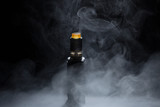 vape close-up in a smoke on a black background