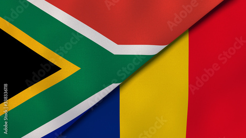 The flags of South Africa and Romania. News, reportage, business background. 3d illustration