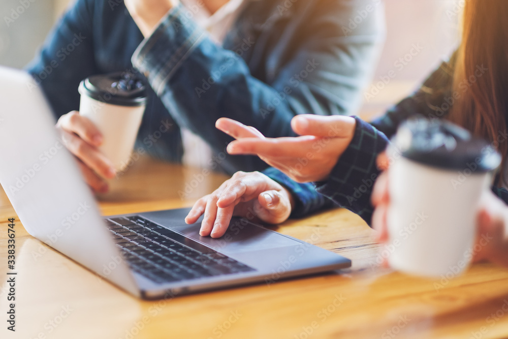 Group of businessman working and using laptop for presentation in a meeting Group of businessman working and using laptop for presentation in a meeting