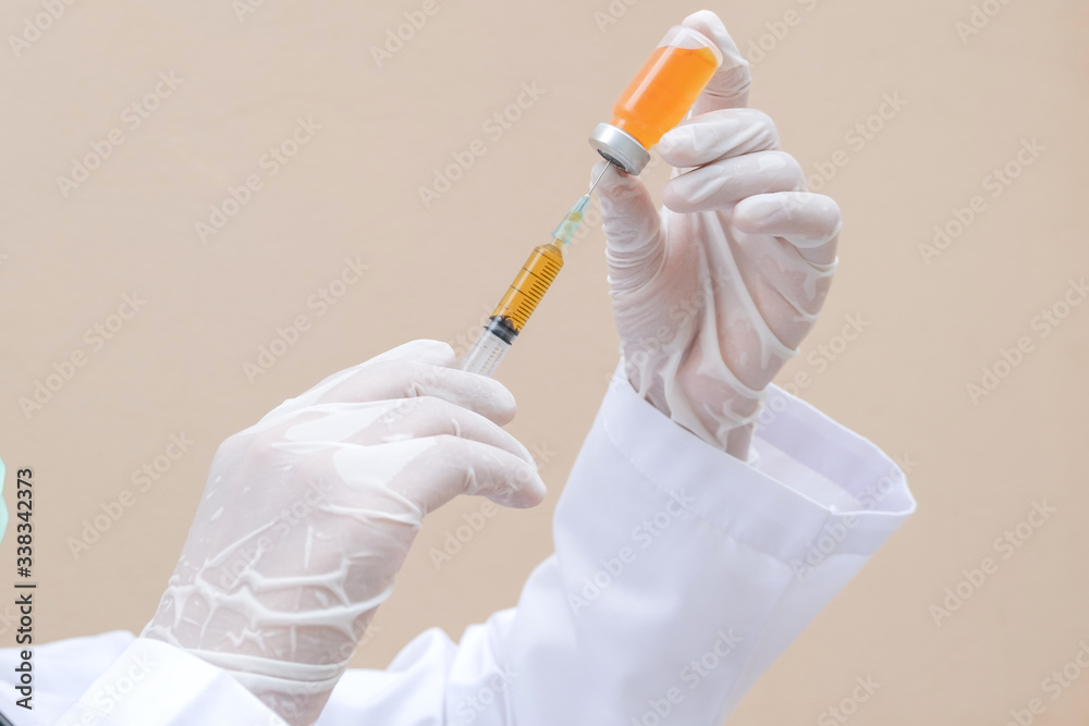 Professional doctors perform testing and analyzing samples of COVID-19 vaccines for immunization prevention and treatment from viral infections. Medical and health care concepts