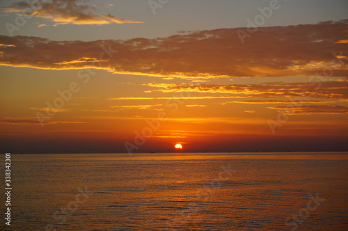 sunrise or sunset on the beach © PUGUH
