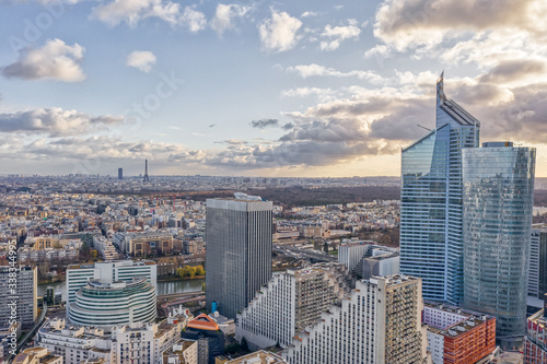 Aerial drone shot of Levallois Paris with Eiffel Tower tour montparnasse, jardin d'acclimation from La Defense area photo