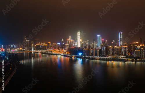 Panoramic aerial night view of Hong Ya Dong cave by Jialing river in Chongqing  southwest China