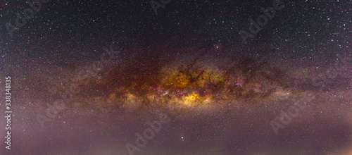 Fototapeta Naklejka Na Ścianę i Meble -  Night scenery with colorful and light yellow Milky Way Full of stars in the sky in summer Beautiful universe Background of space
