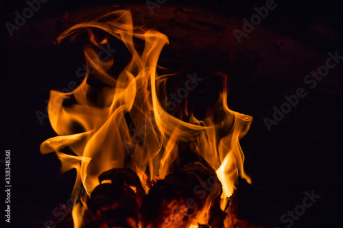 Fiery figures. Fire flames on black background