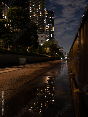 High rise buildings reflected in the rain in Tokyo