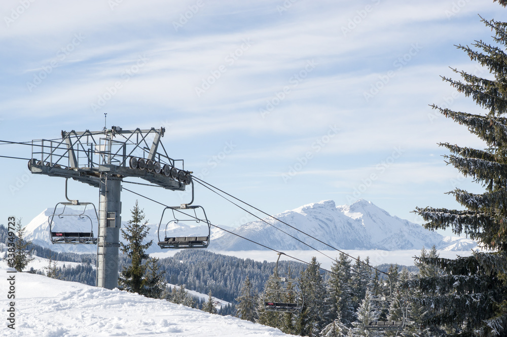 Ski Chairlift going down a mountain in the French Alps Ski Chairlift going down a mountain in the French Alps