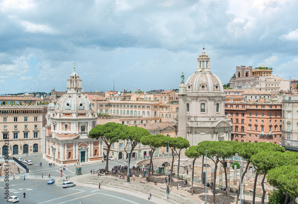The Church of Santa Maria di Loreto (left), the Church of the Most Holy Name of Mary (right), and Trajan's column, seen from the Vittorio Emanuele II monument, Rome.