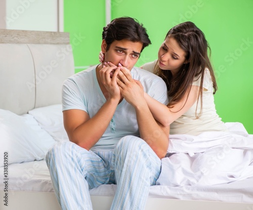 Young woman consoling disappointed impotent husband