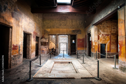 Entrance vestibule inside the of the House of Menander  Pompeii  Italy. The impluvium in the middle of the floor was designed to carry away rainwter coming through the roof.