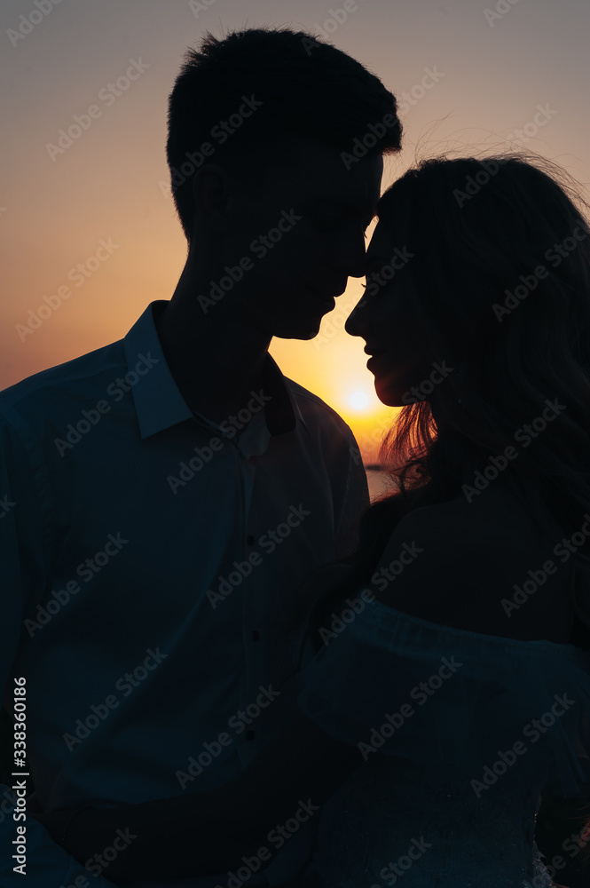 
couple in love at sunset