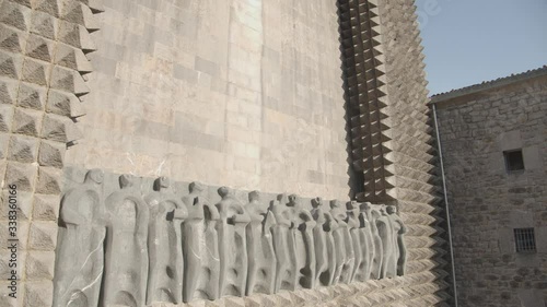 Close up of main facade frieze representing the apostles of Aranzazu sanctuary photo