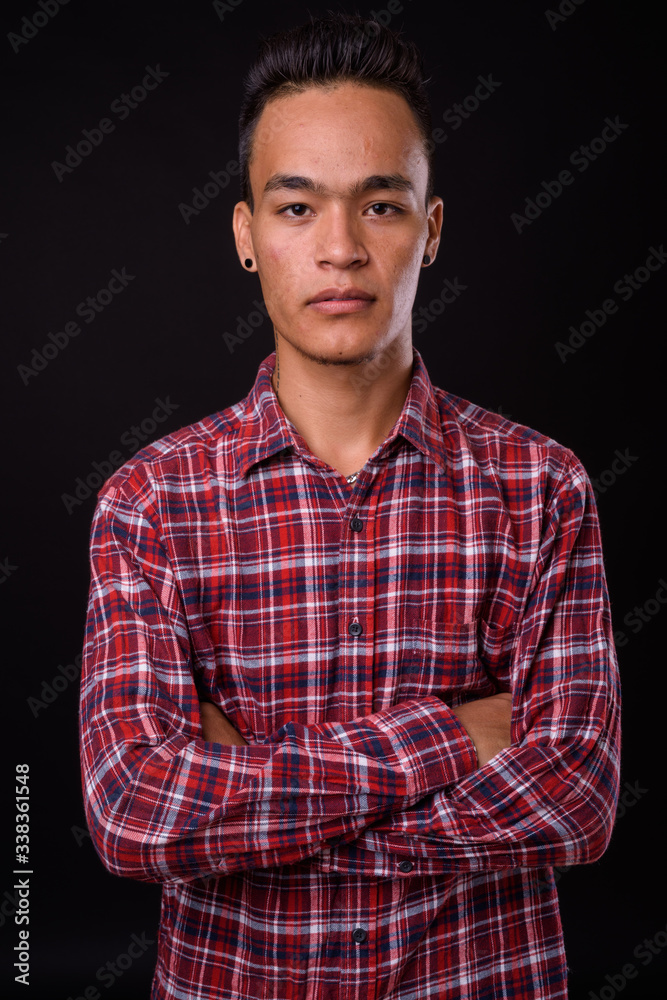 Portrait of young handsome Indian hipster man Portrait of young handsome Indian hipster man