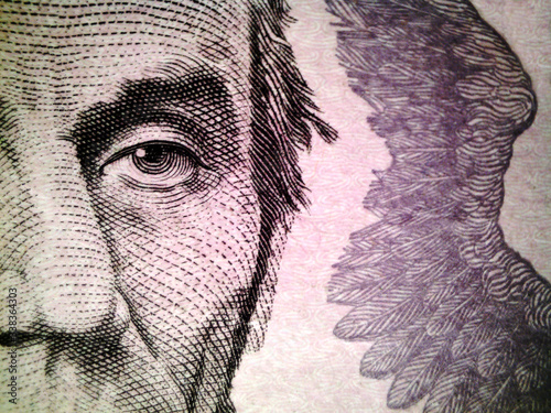 Macro close up of Abraham Lincoln`s face on the US $5 dollar bill - Image  photo