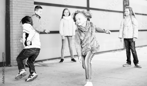 kids playing catch in yard