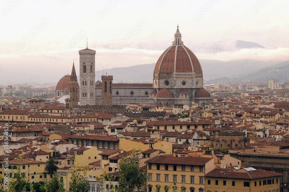 View of the city of Florence Italy at sunset highlights the Duomo and the Cathedral of Florence Santa Maria del Fiore.