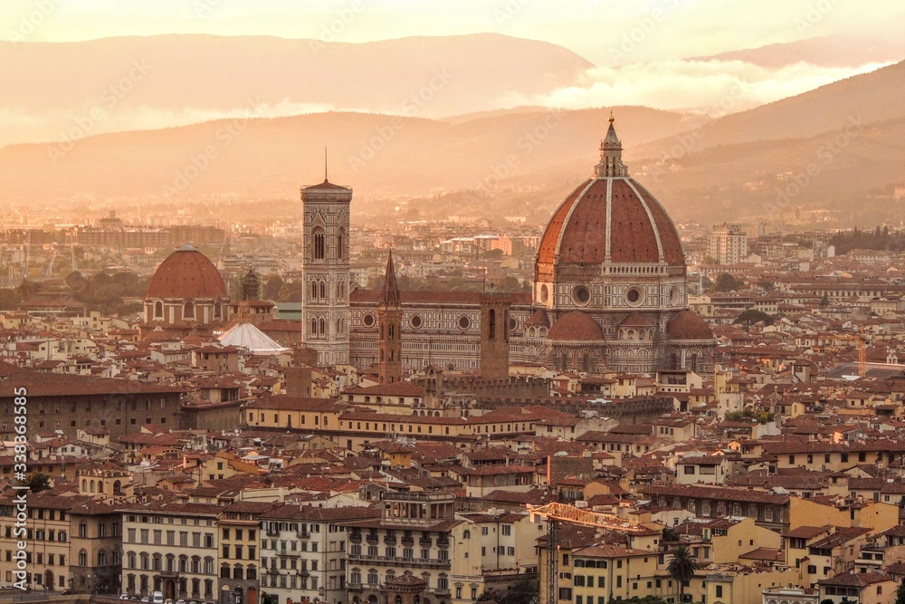 View of the city of Florence Italy at sunset, highlights the Duomo and the Cathedral of Florence Santa Maria del Fiore.