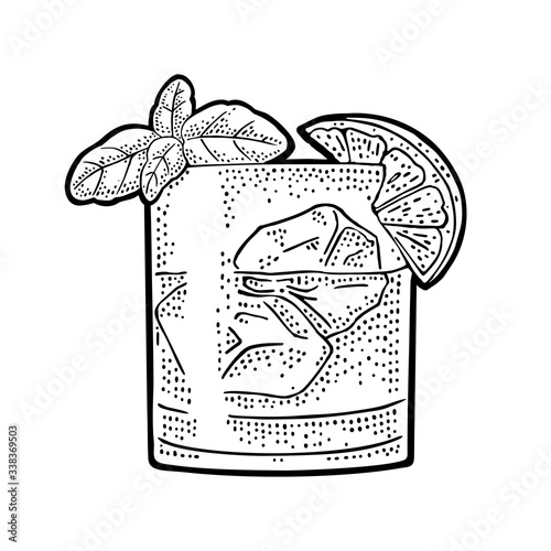 Glass cocktail gin basil smash. Vintage black vector engraving