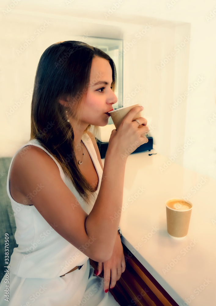 Young beautiful girl holding a cup of coffee in cafe. Outdoor portrait of young beautiful woman posing while traveling holiday vocation. Girl with coffee. Female traveler, travel vacation fun summer. Young beautiful girl holding a cup of coffee in cafe. Outdoor portrait of young beautiful woman posing while traveling holiday vocation. Girl with coffee. Female traveler, travel vacation fun summer.