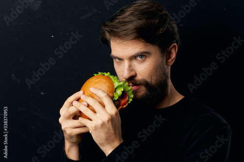 young man eating an apple
