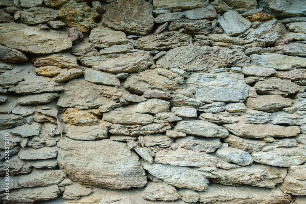 Obraz premium stary kamienny mur jako obraz tła