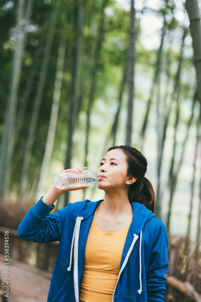 young asian beauty woman drink water outdoors young asian beauty woman drink water outdoors