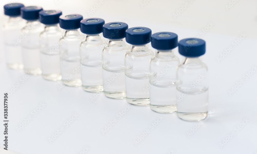 injection ampoules for vaccination on a white background, healthcare coronavirus, cancer, painand treatment, pharmaceutical medicine concept . injection ampoules for vaccination on a white background, healthcare coronavirus, cancer, painand treatment, pharmaceutical medicine concept .