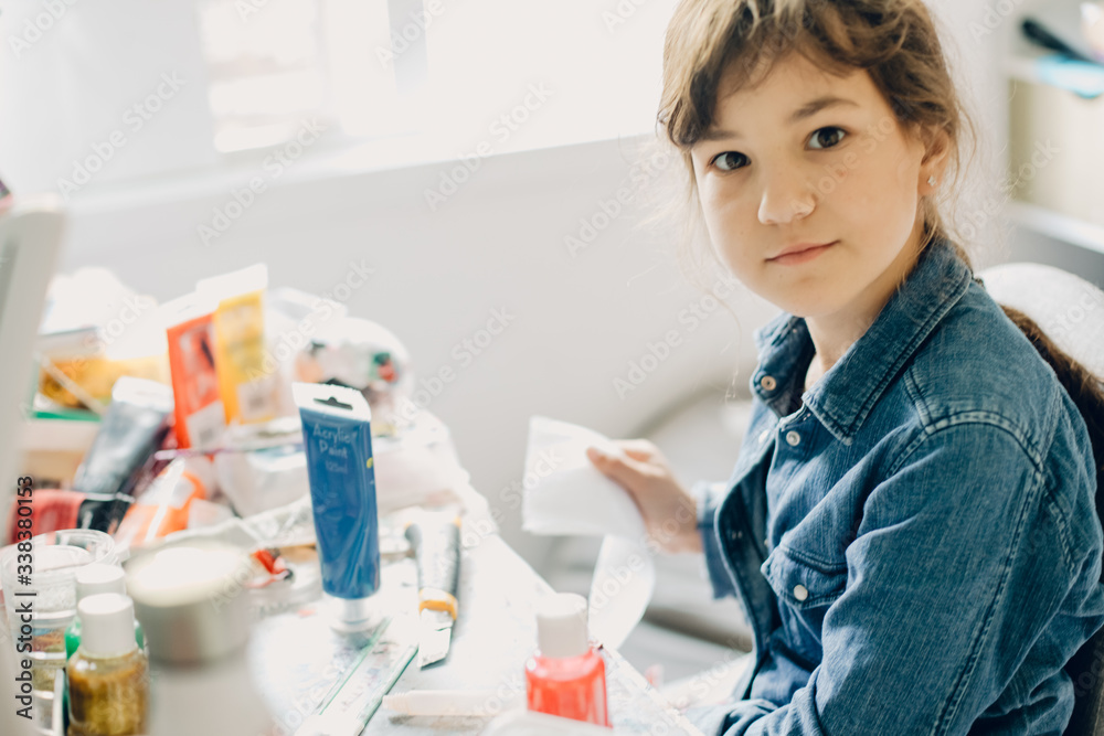 portrait of young child girl crafting at home portrait of young child girl crafting at home