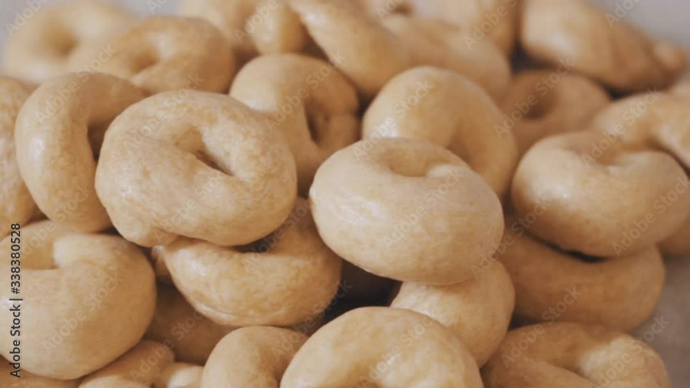 pile of freshly cooked homemade taralli, traditional italian food, macro pile of freshly cooked homemade taralli, traditional italian food, macro